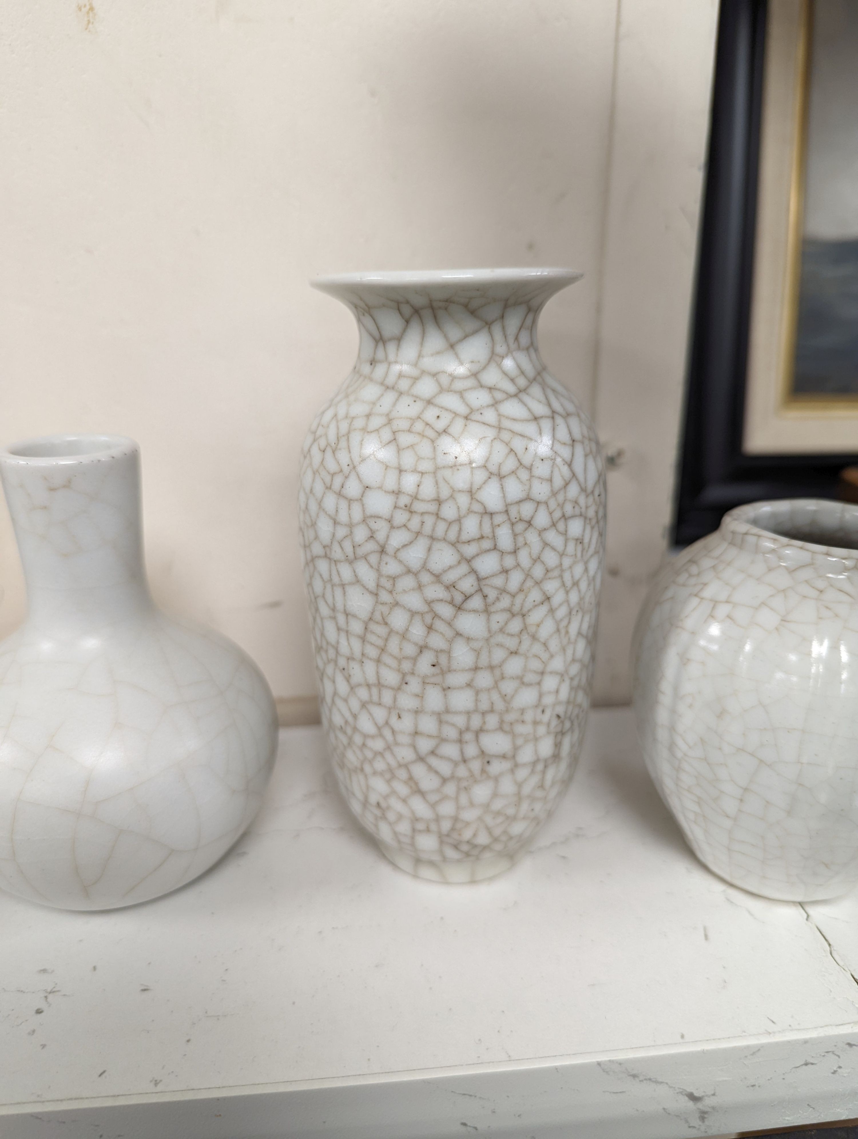 Four Chinese crackle glaze vases, tallest 16 cms high.